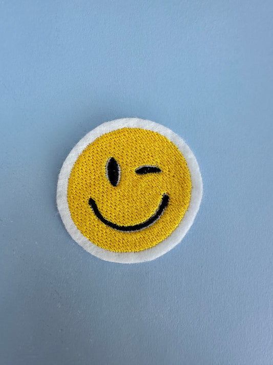 Blinkende smiley broderi