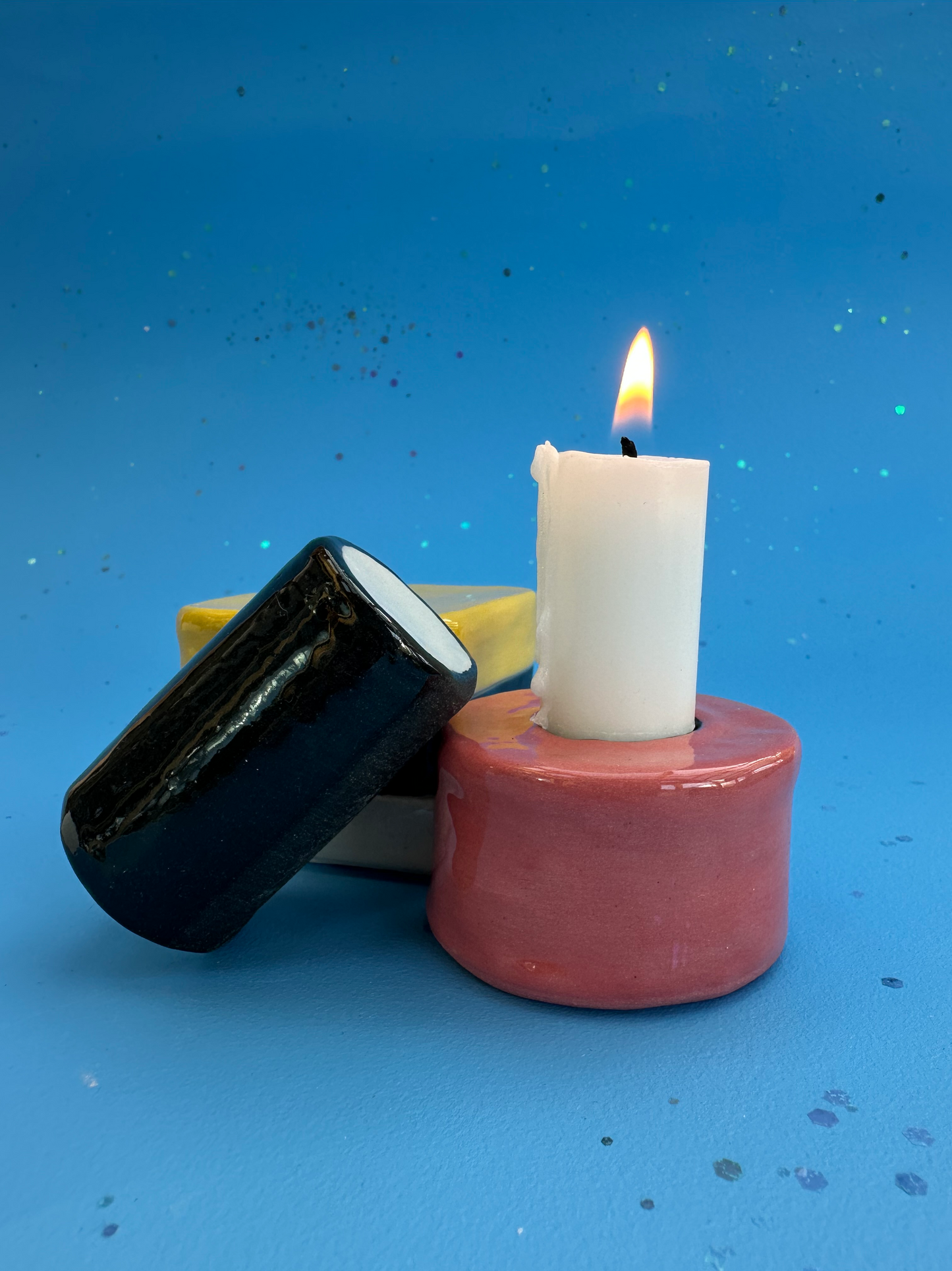 Lysestage i lakridskonfekt